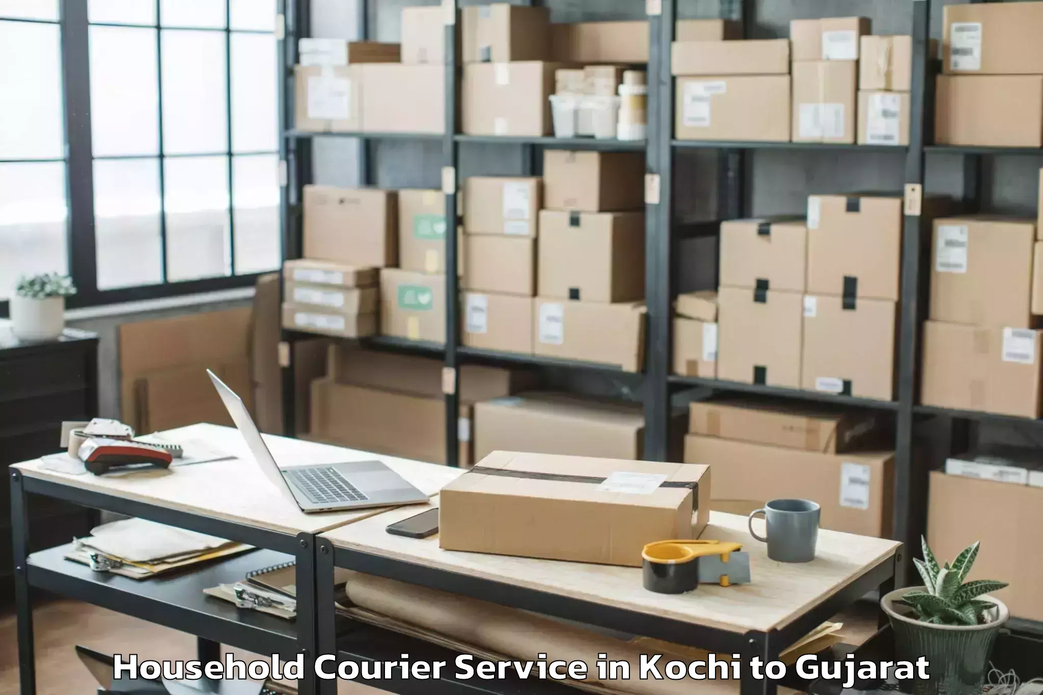 Book Kochi to Jhagadia Household Courier Online